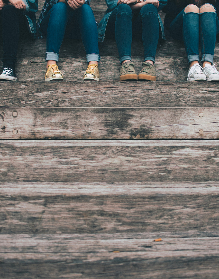 Teens sitting on steps